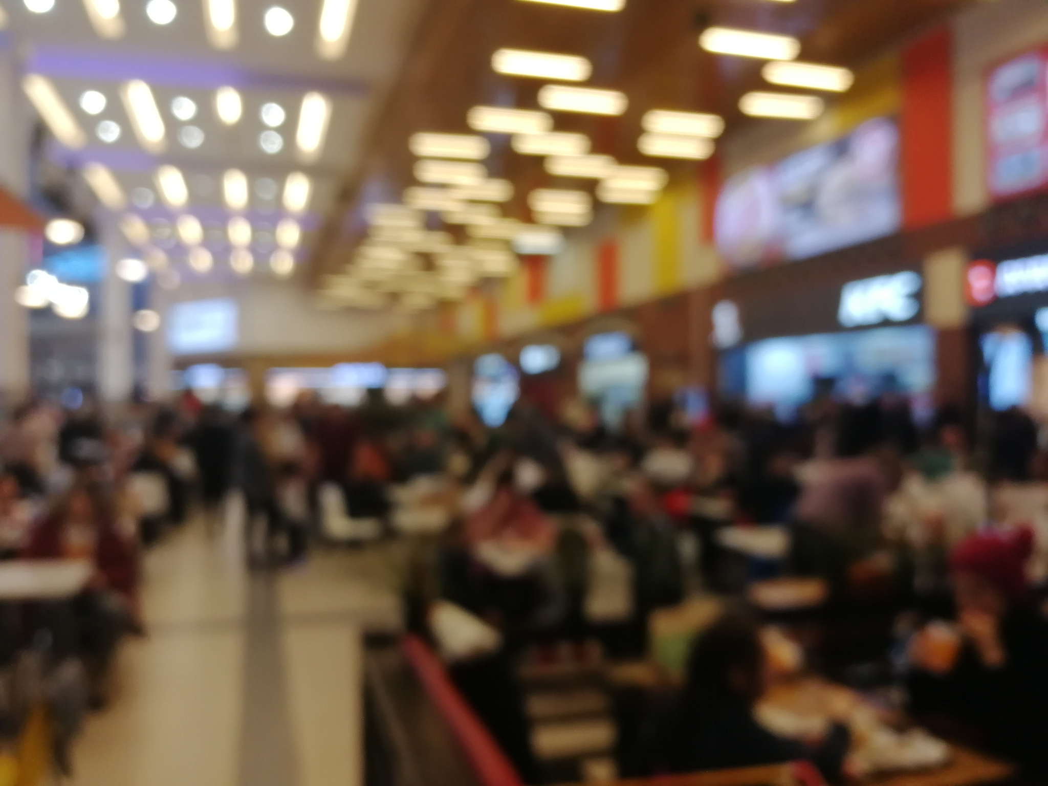Blurred background. Food court of mall.